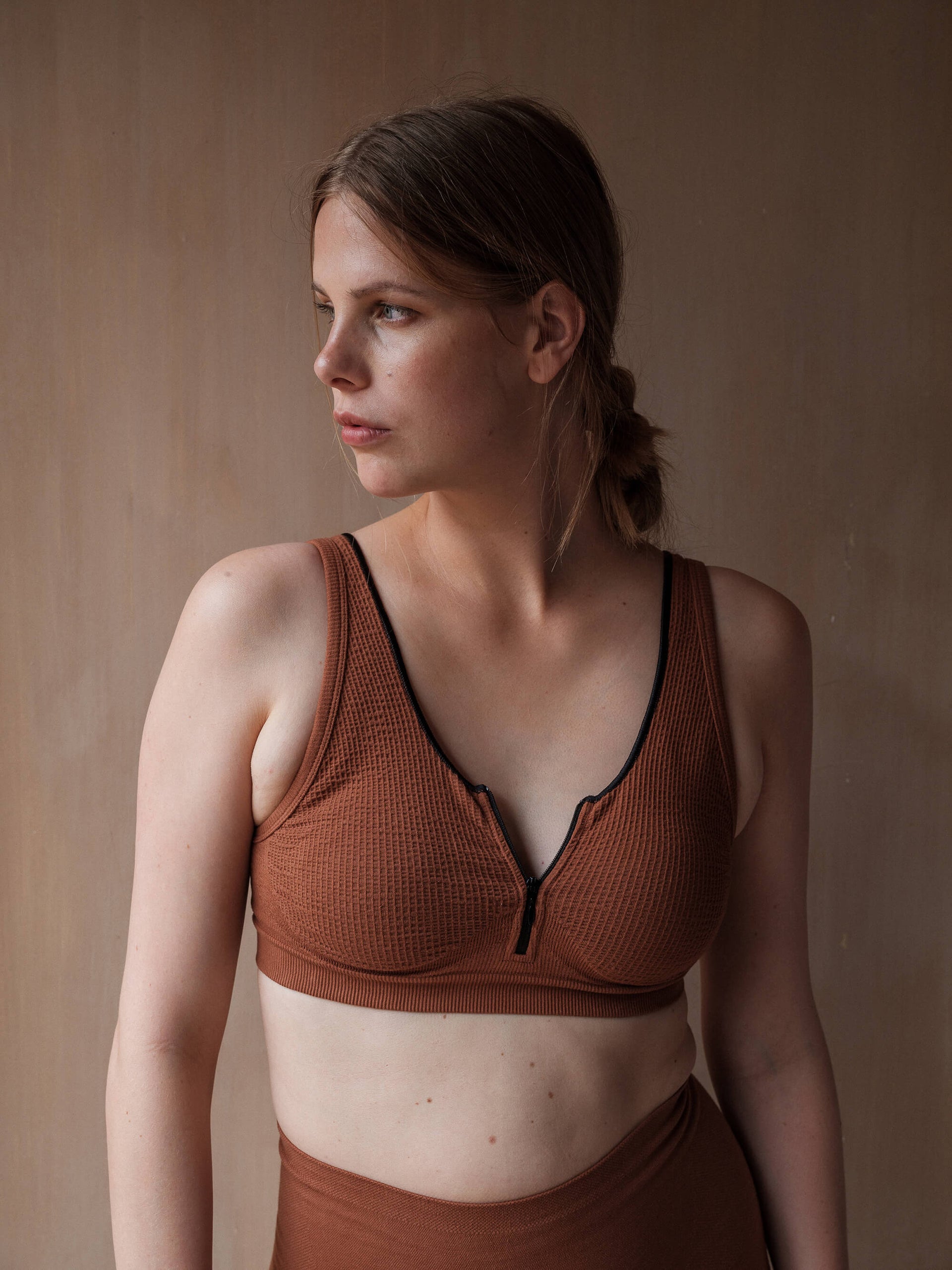 Jorgen House Ginger colour zip front bra on female body