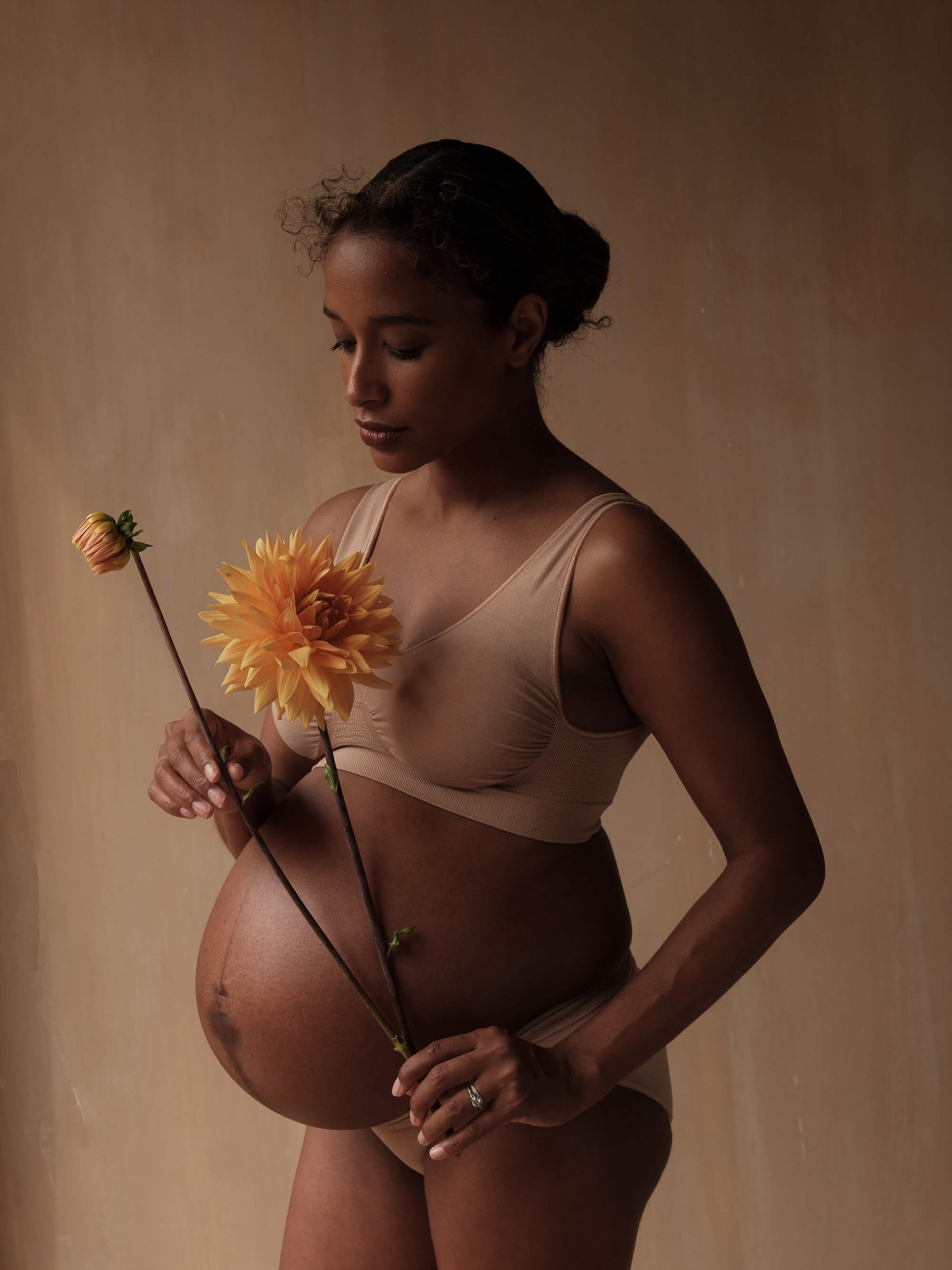 Jorgen House sand colour maternity breastfeeding sleep bra on a pregnant female body