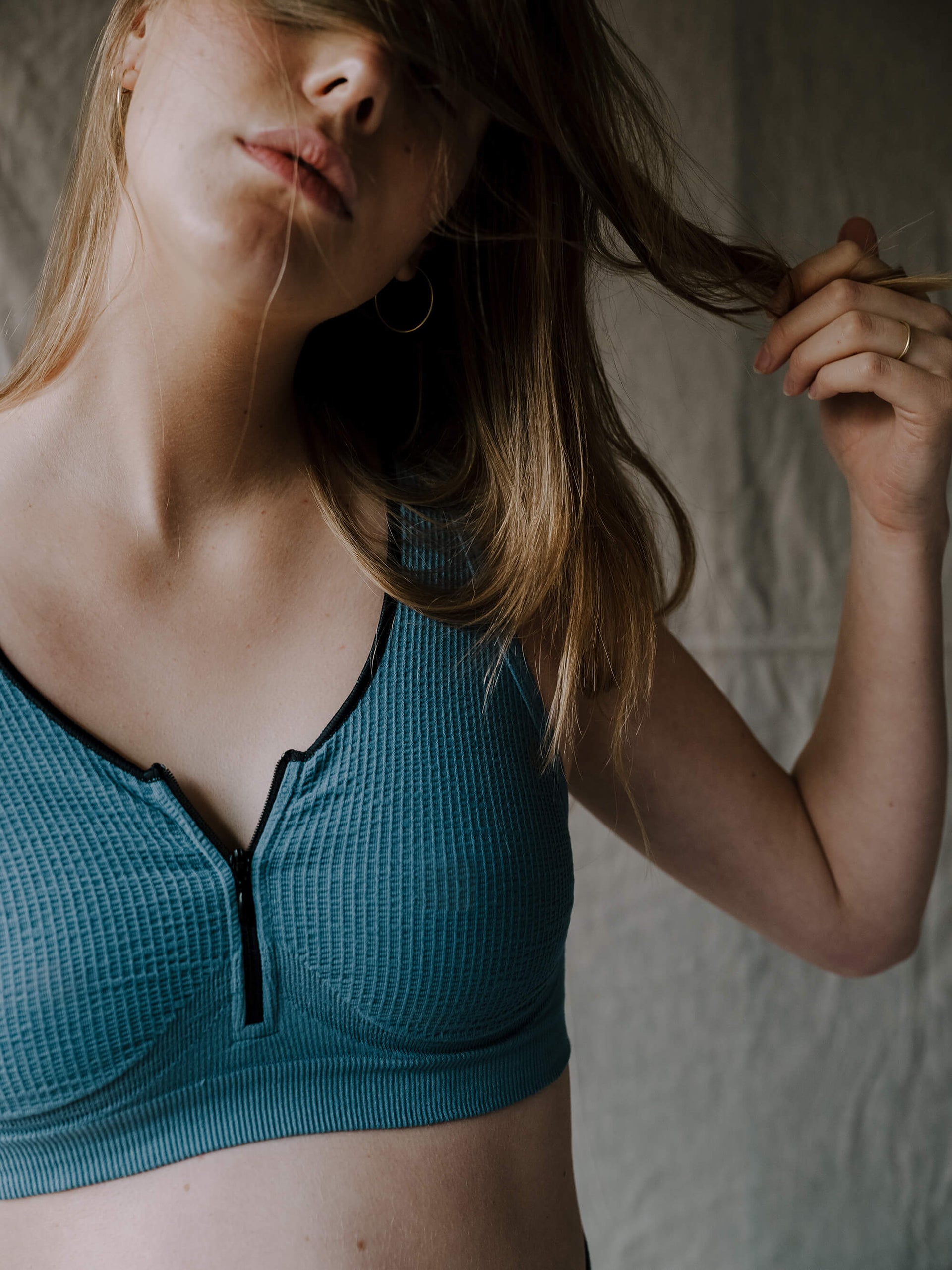 Jorgen House Blue zip front crop bra on female body