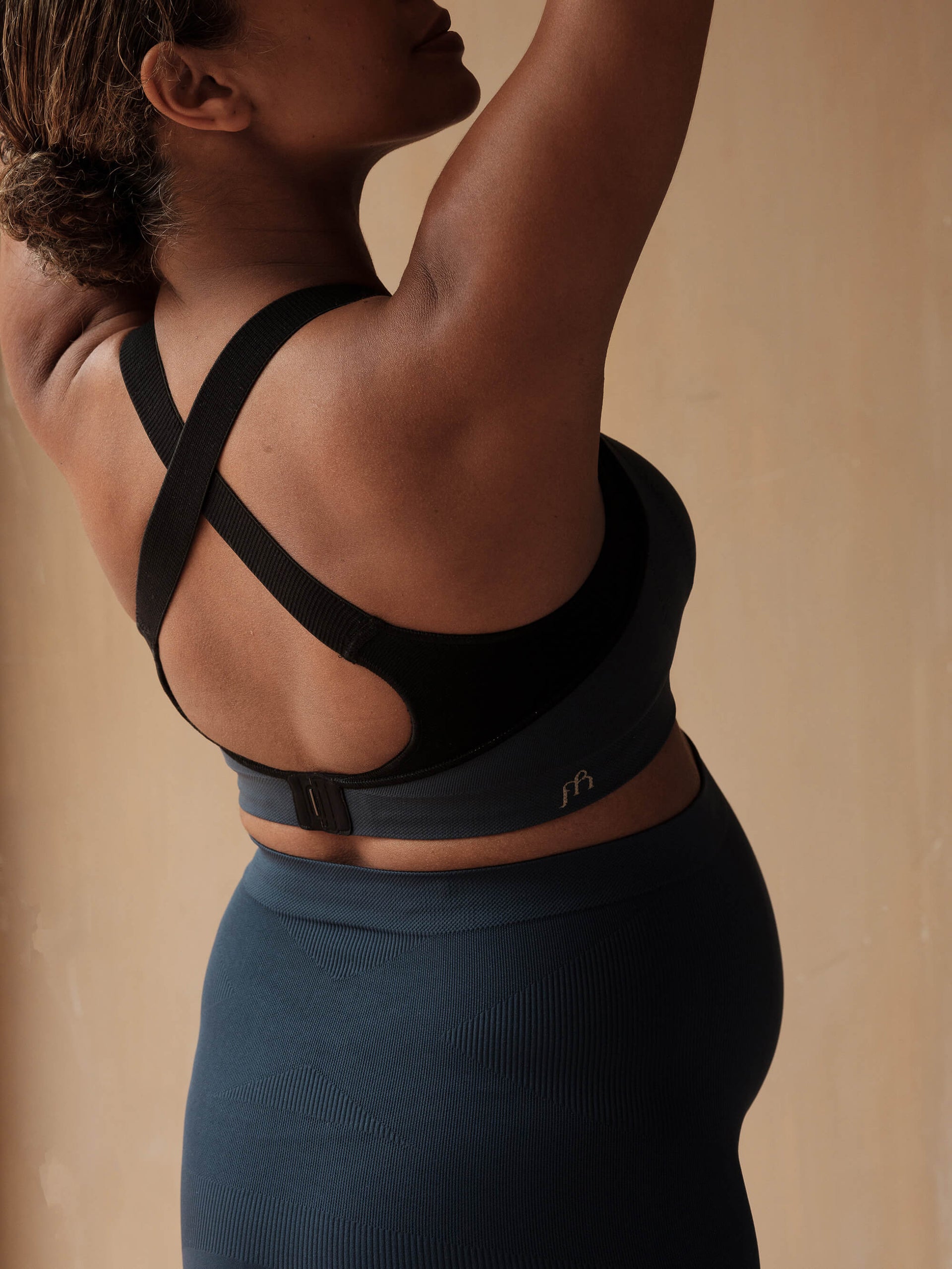 Jorgen House midnight blue maternity breastfeeding sports bra and high waist leggings on pregnant female body