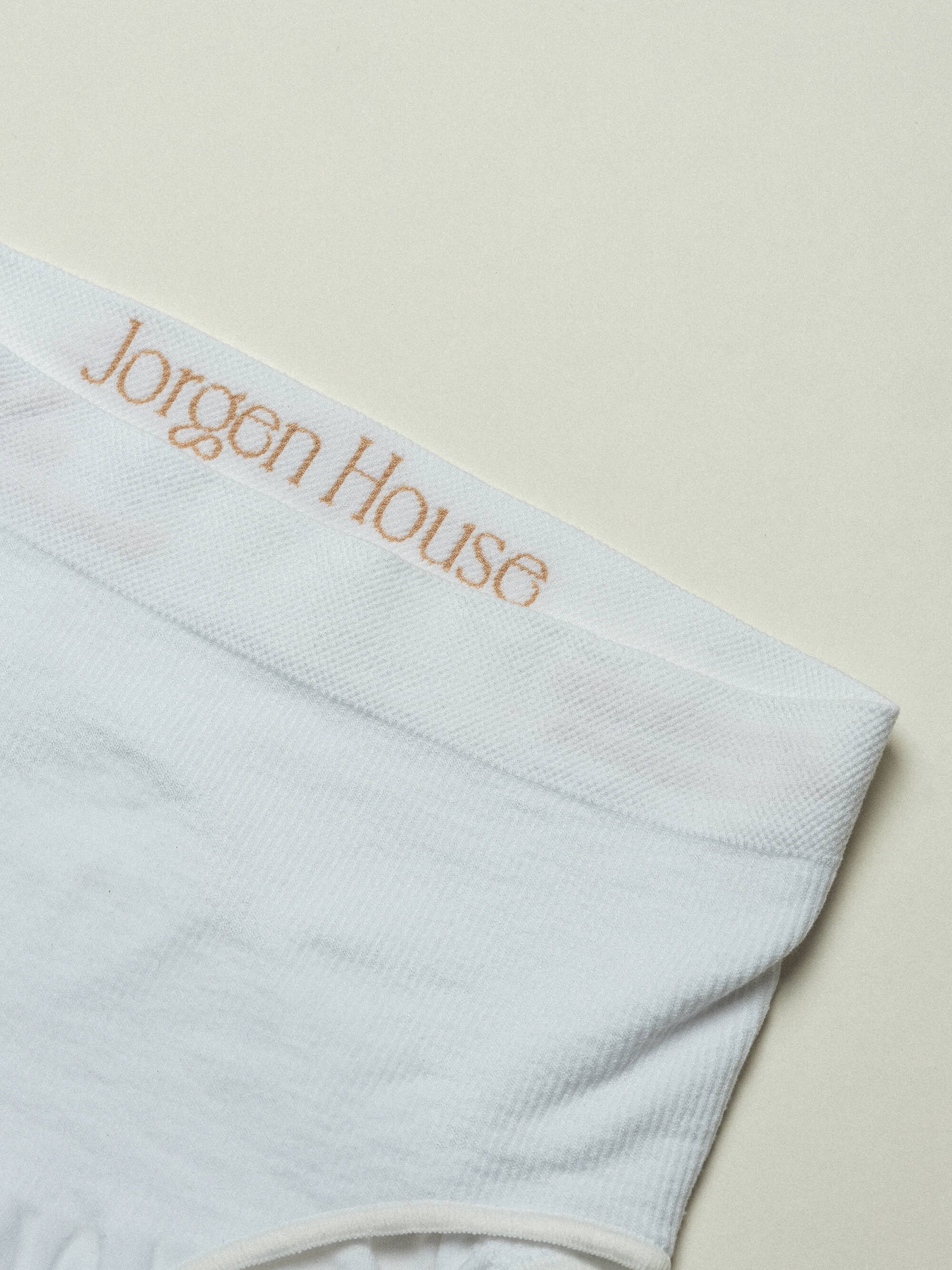 Jorgen House close up image of white support briefs