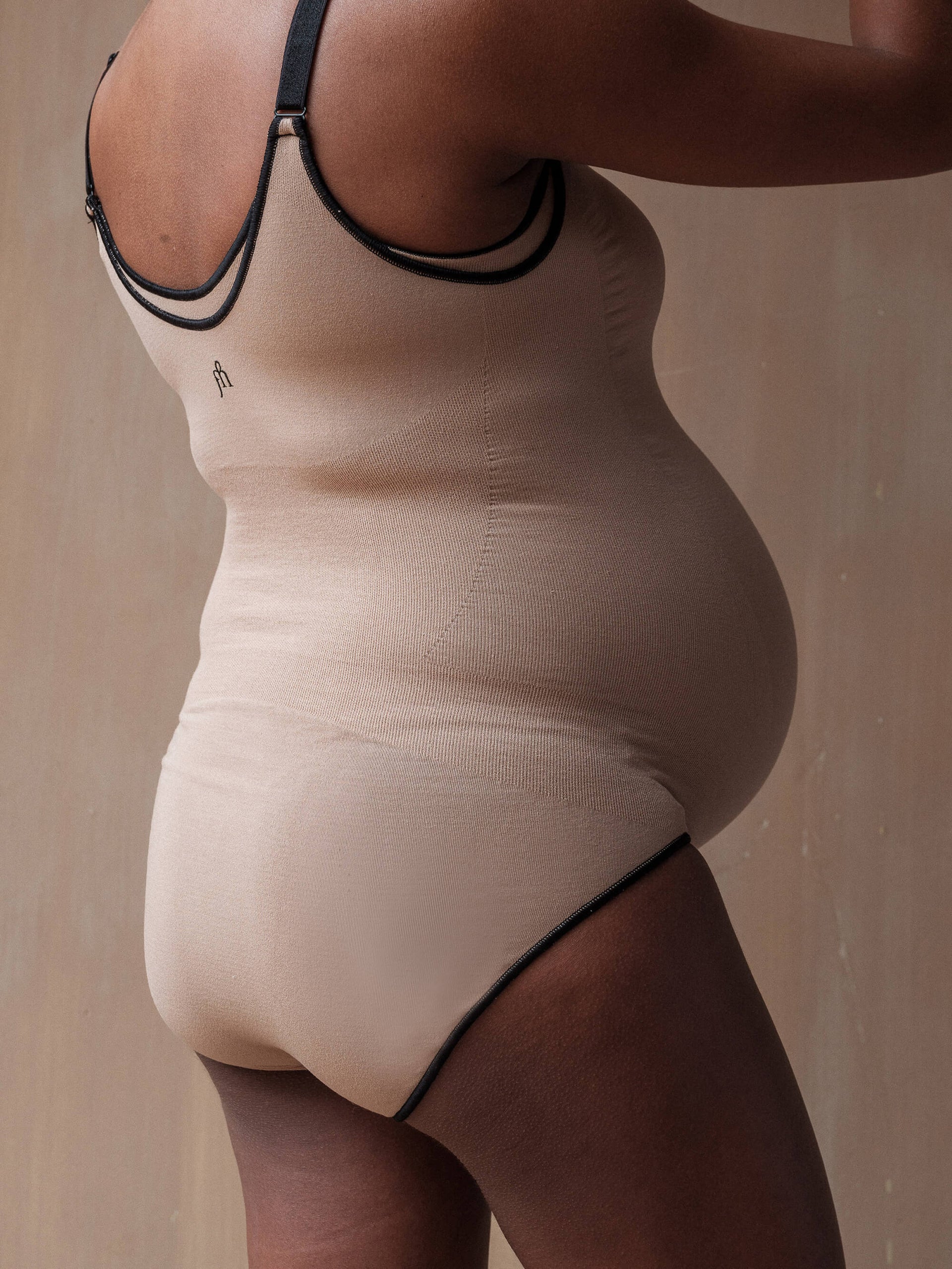 Jorgen House Sand colour maternity bodysuit on pregnant female body